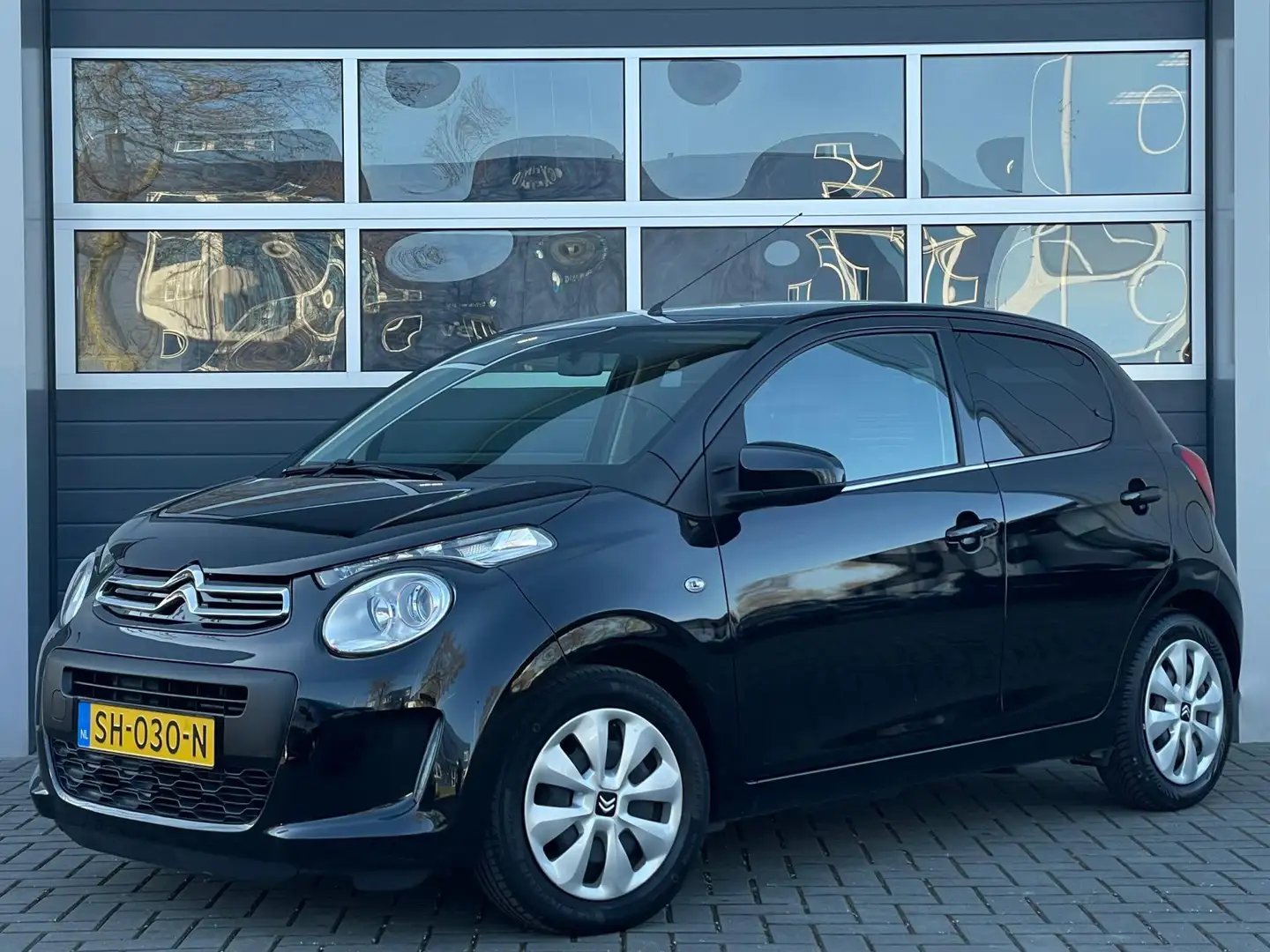 Citroen C1 1.0 e-VTi Feel | Airco | Cruise control | Elektris Zwart - 1