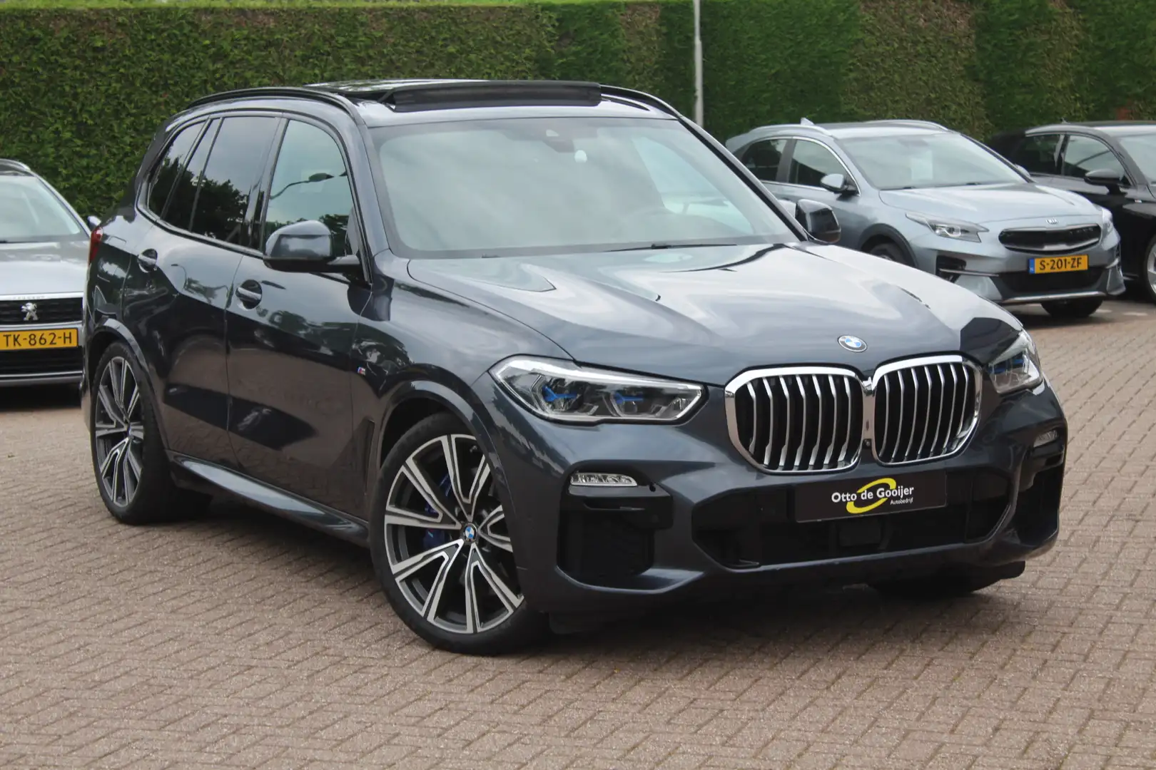 BMW X5 xDrive45e High Exe. M Sport / Panoramadak / 360Cam Grijs - 1