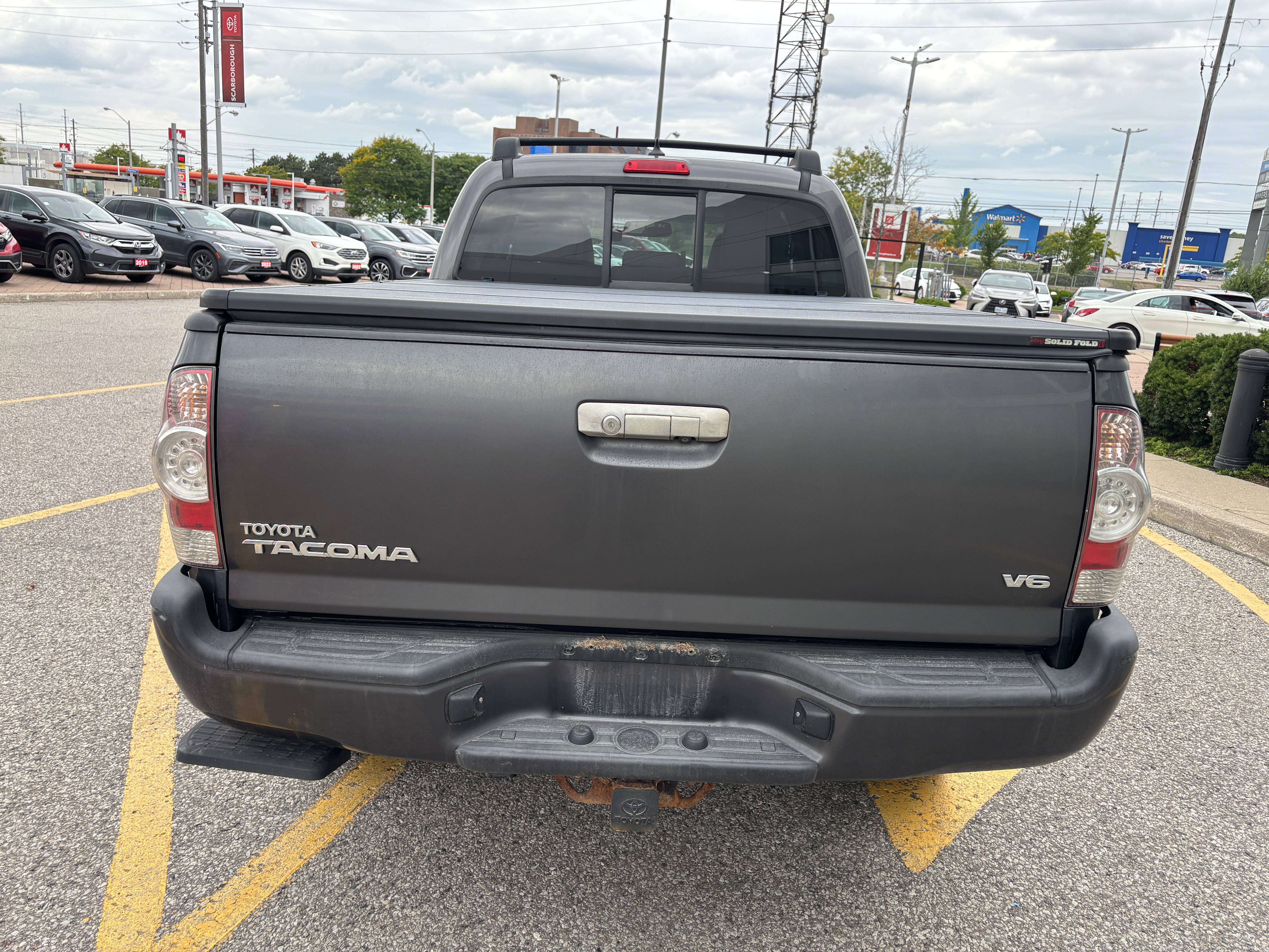 used 2015 Toyota Tacoma car, priced at $20,995