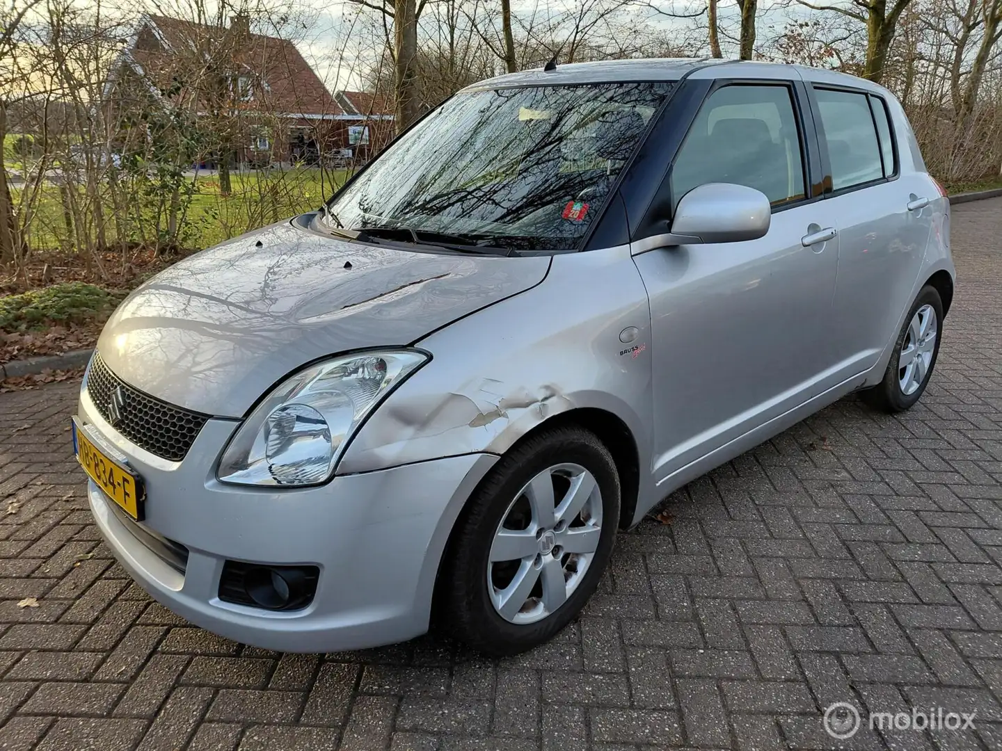 Suzuki Swift 1.3 Bandit Airco NAP 157802 KM APK 29-6-2026 Grau - 1