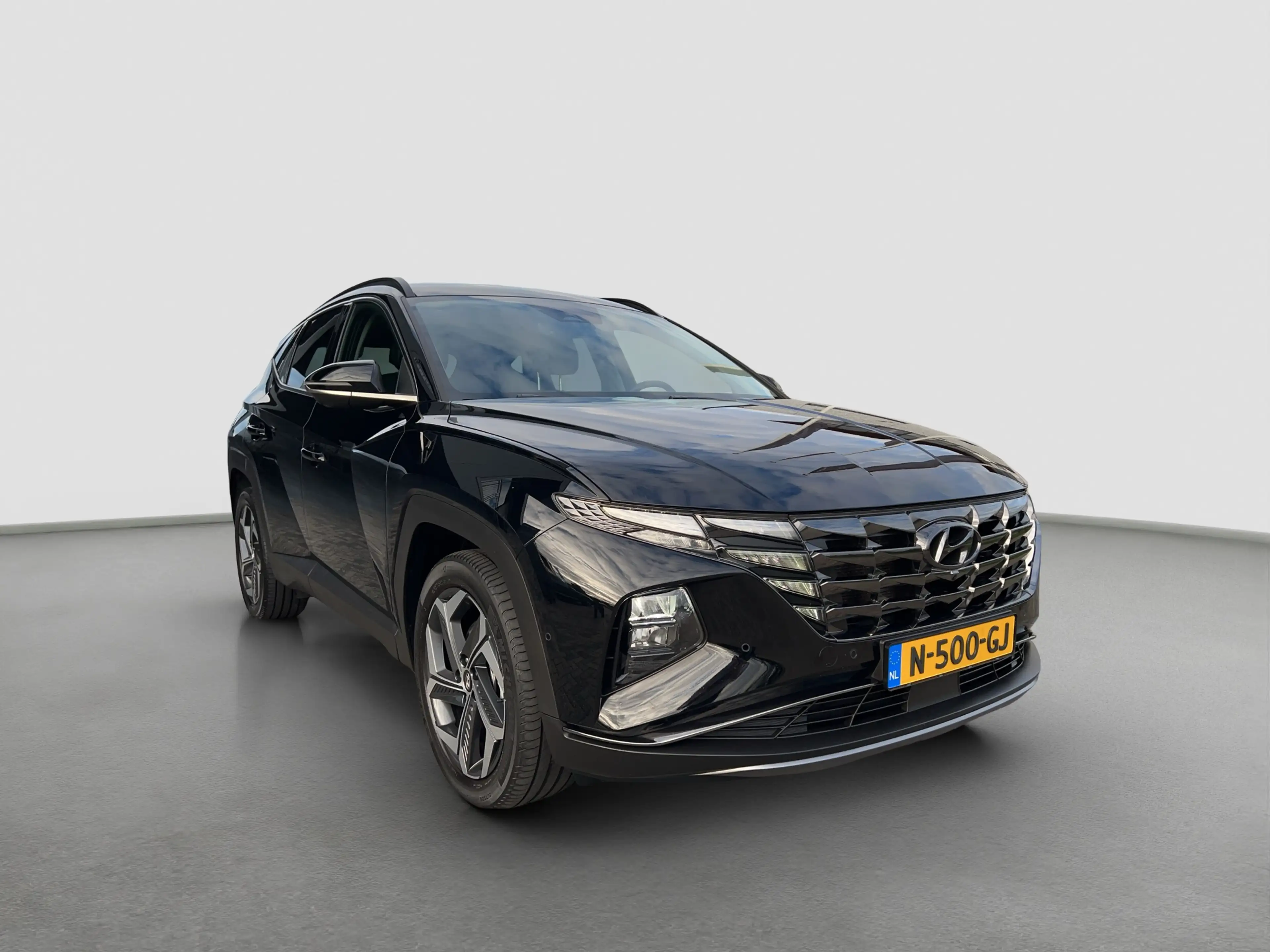 Hyundai TUCSON 1.6 T-GDI HEV 230pk Premium | Carplay | Leder | Tr — photo 2