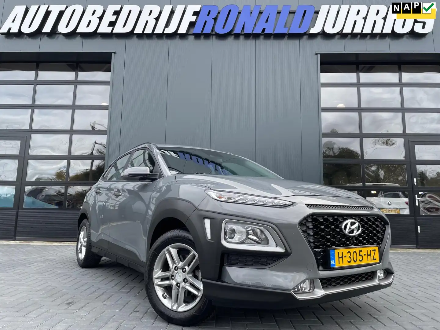 Hyundai KONA 1.0 T-GDI Comfort NL.Auto/Trekhaak/Carplay/Climatr Grijs - 1