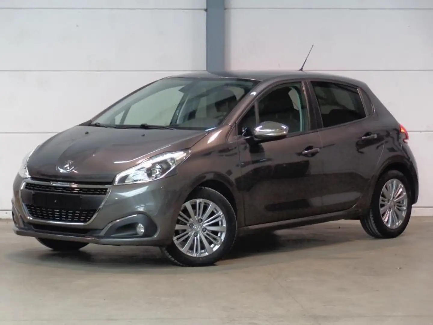 Peugeot 208 1.2i Signature - GPS - Clim Grijs - 1