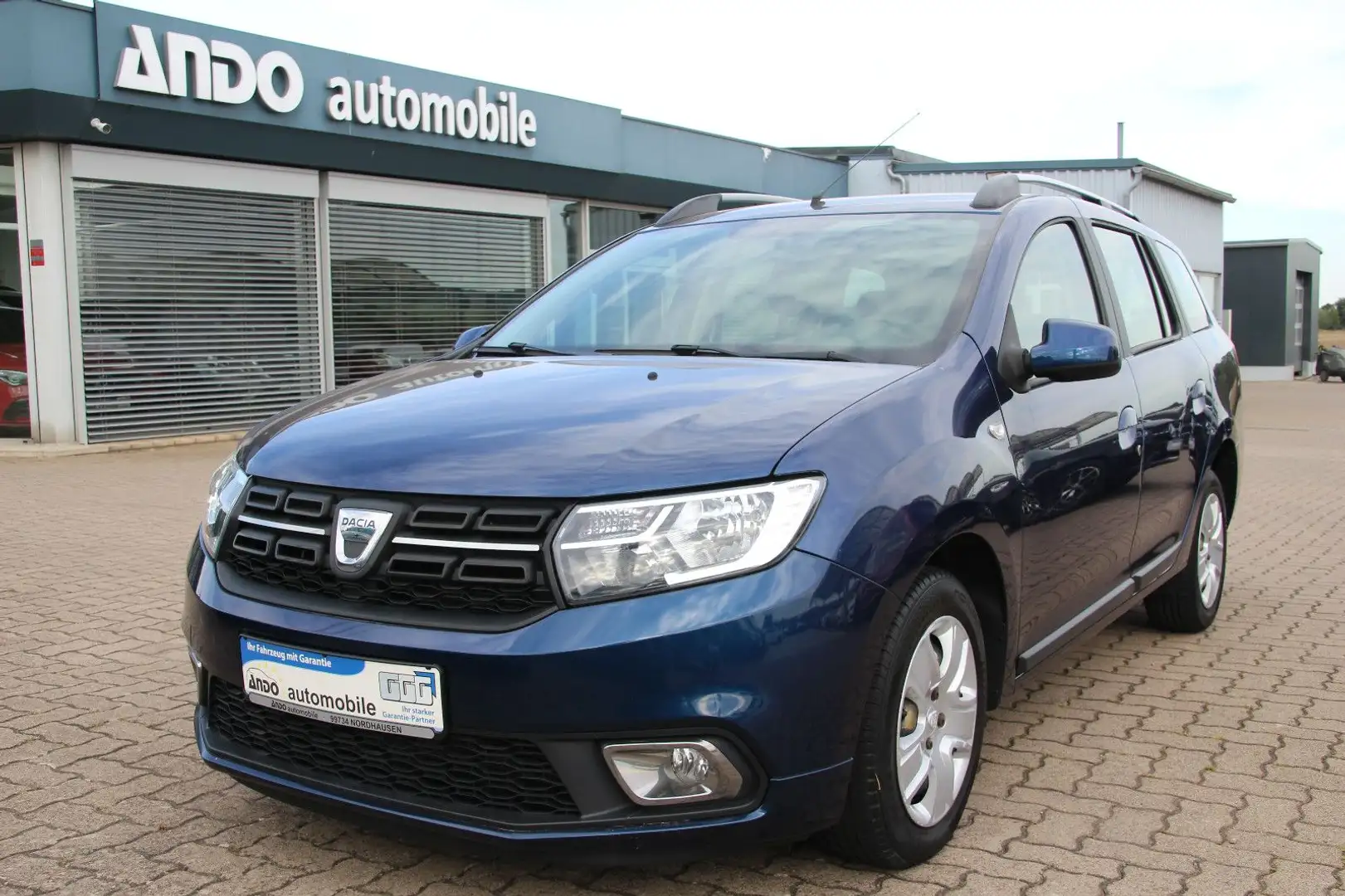 Dacia Logan 0.9 MCV II Kombi Laureate Klima/Navi/1Hand Blau - 1