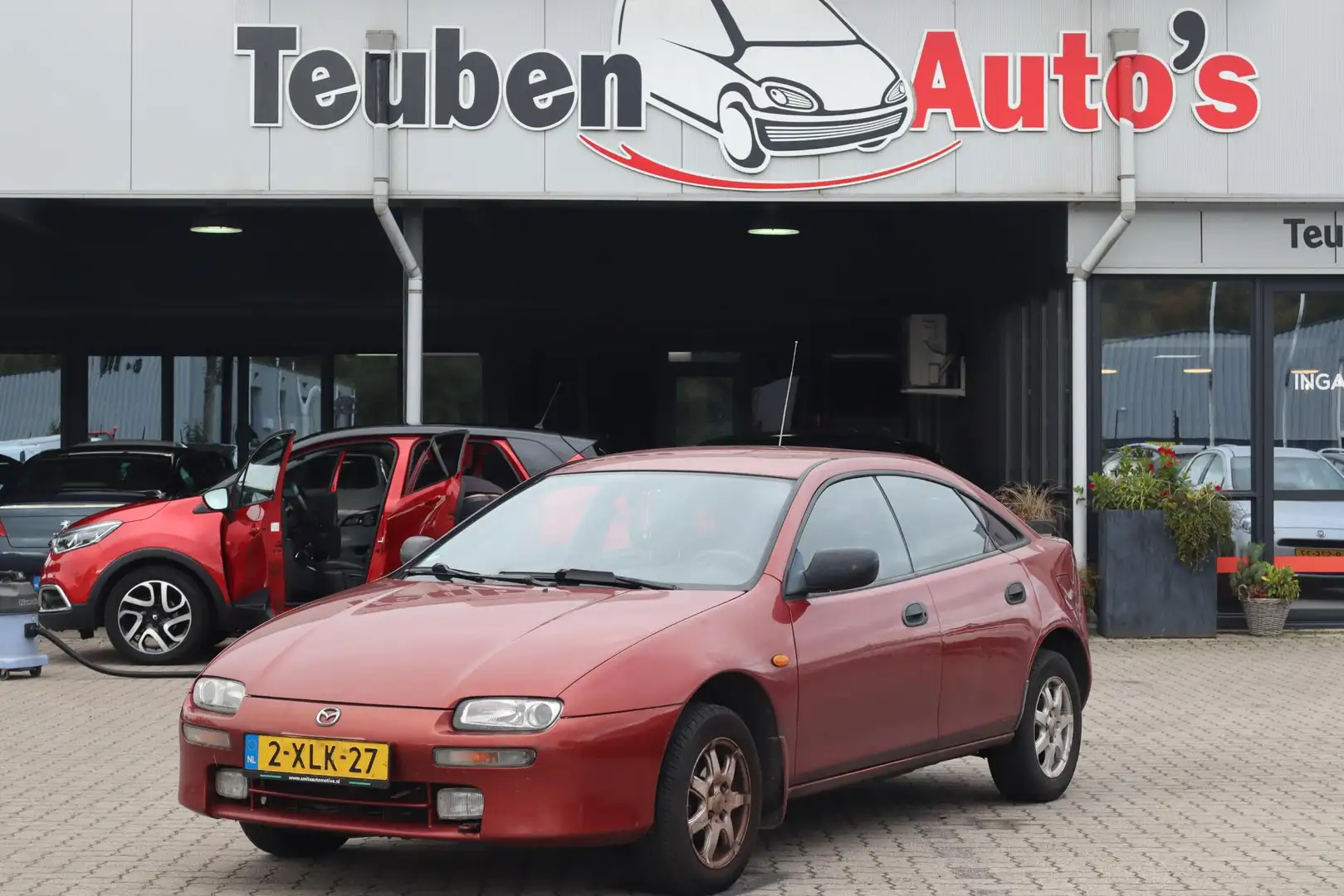 Mazda 323 1.5i F GX Indigo Airco, Elektrische ramen, Lichtme Brun - 1