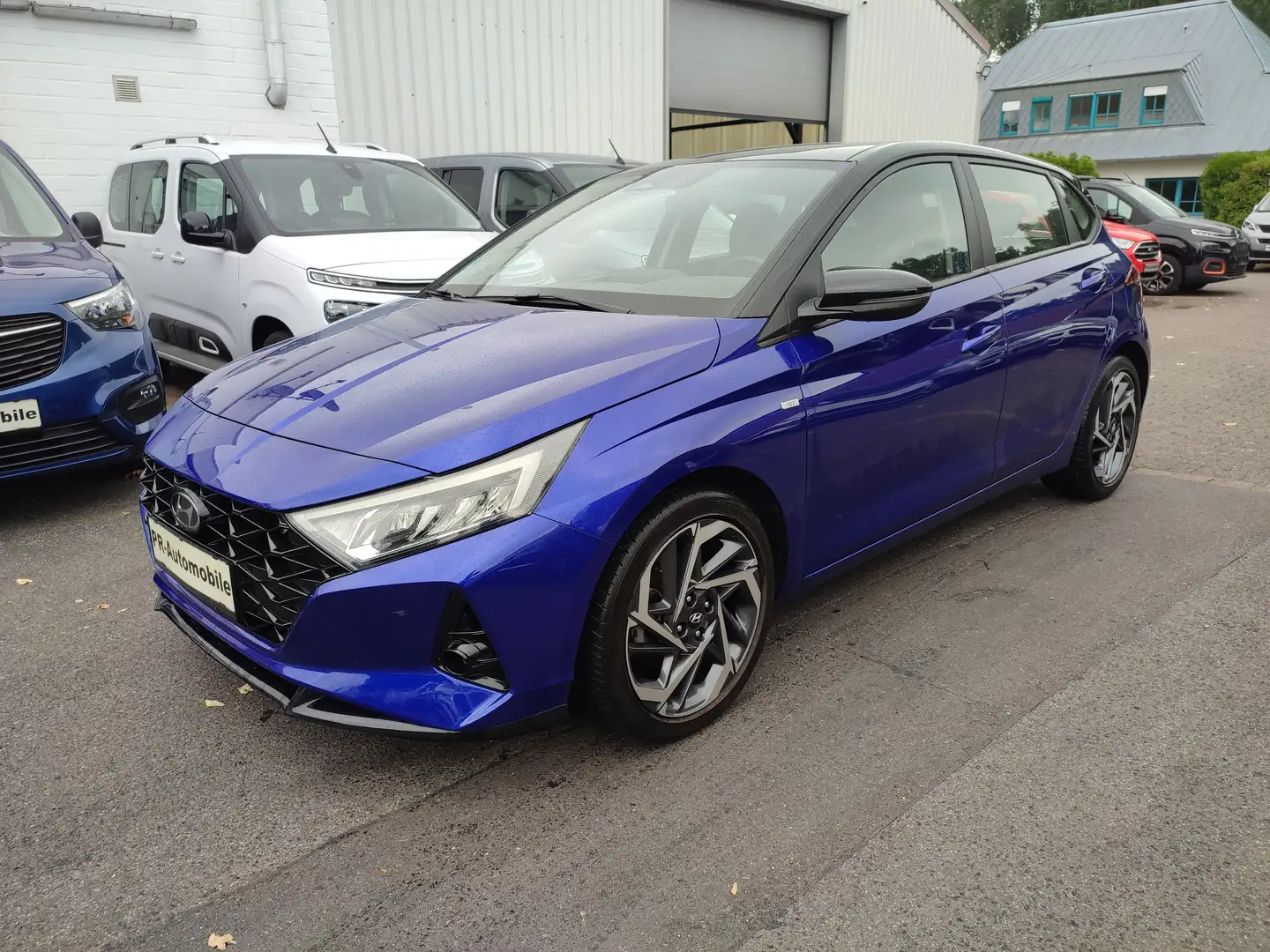 Hyundai i20 1.0 T-GDI Klimaaut/Navi/PDC+Cam/Bose/Alu Blau - 1