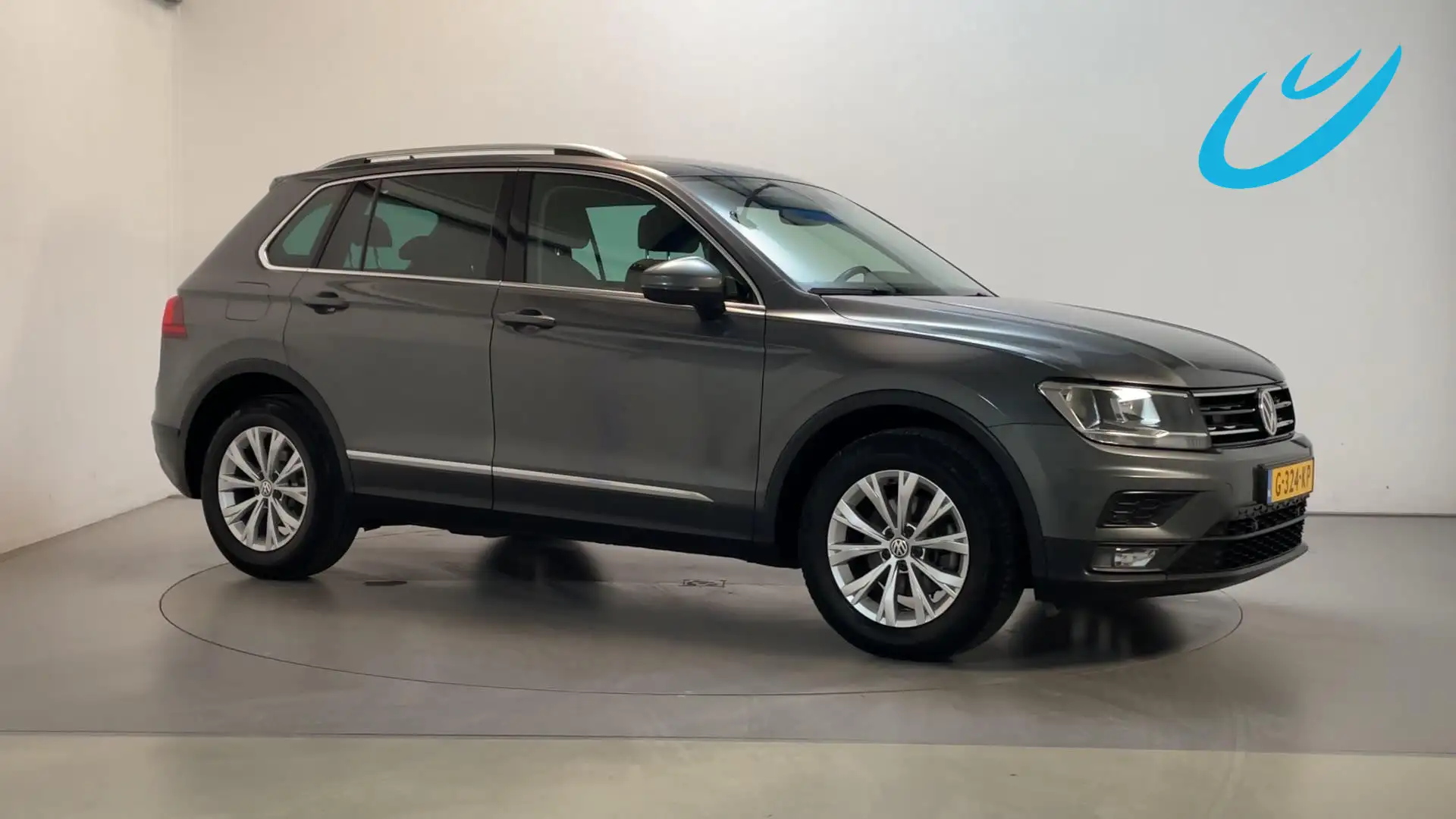 Volkswagen Tiguan 1.5 TSI Comfortline Business Navigatie Parkeersens Grijs - 1