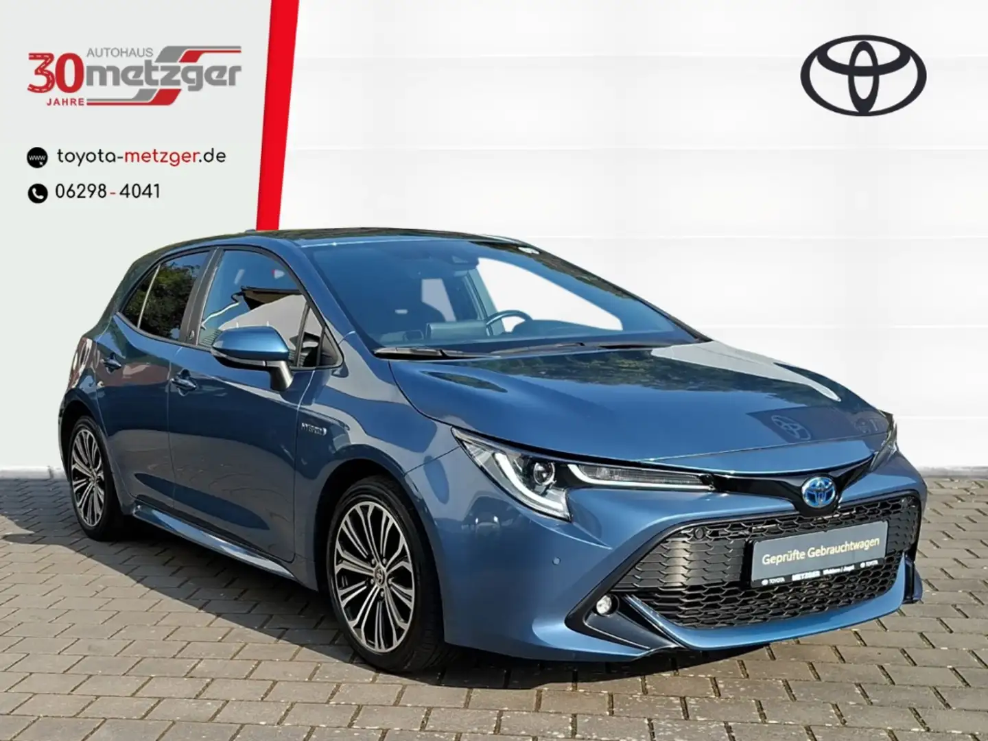 Toyota Corolla 2.0 Hybrid Team D + Apple CarPlay +Android Auto +S Blau - 1