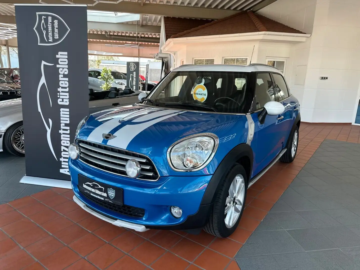 MINI Cooper Countryman *  SitzH. / AHK / Garantie * Modrá - 1