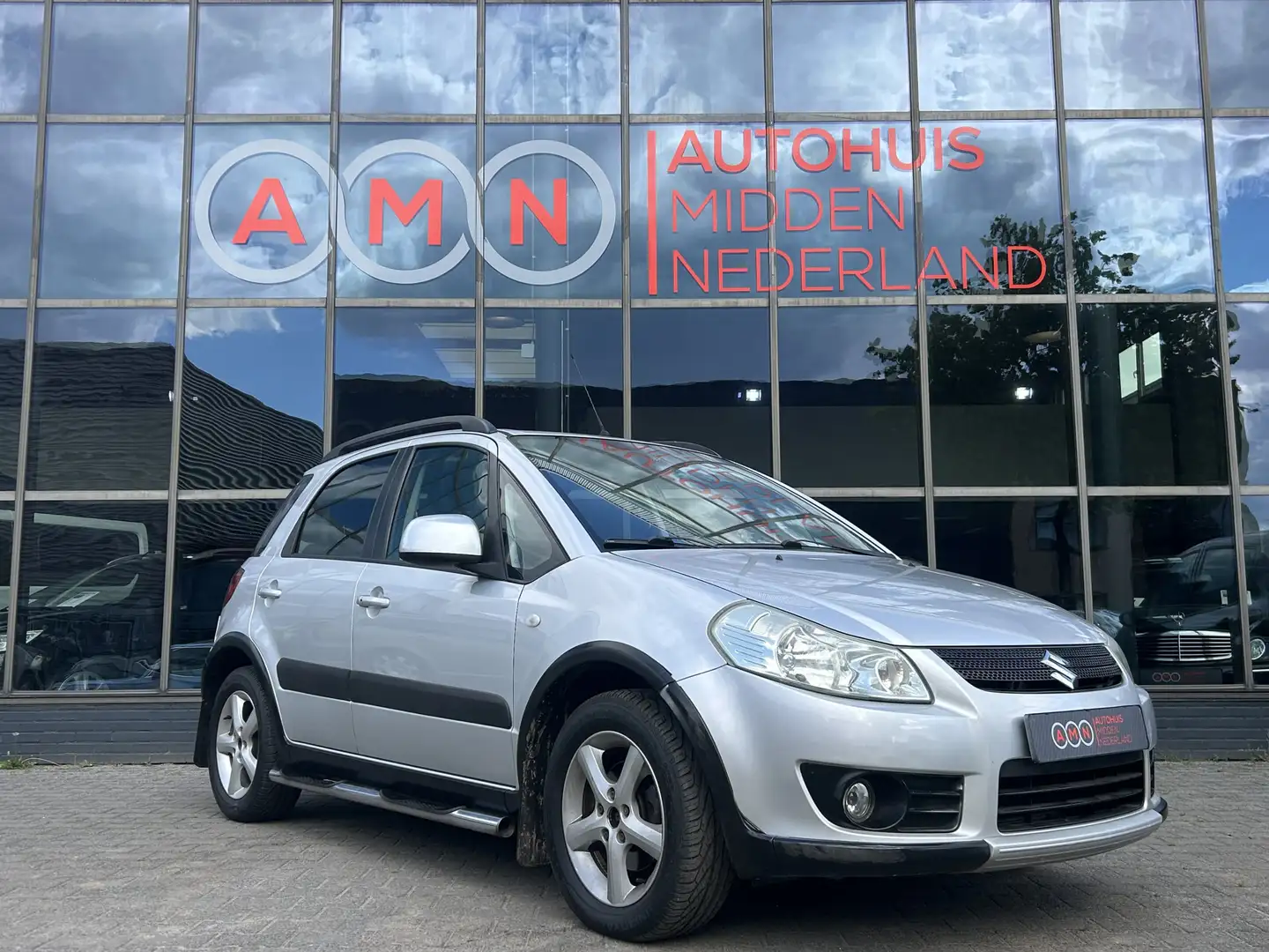 Suzuki SX4 1.6 Comfort Elekpakket,Navigatie,Airco,LMV16” Gris - 2