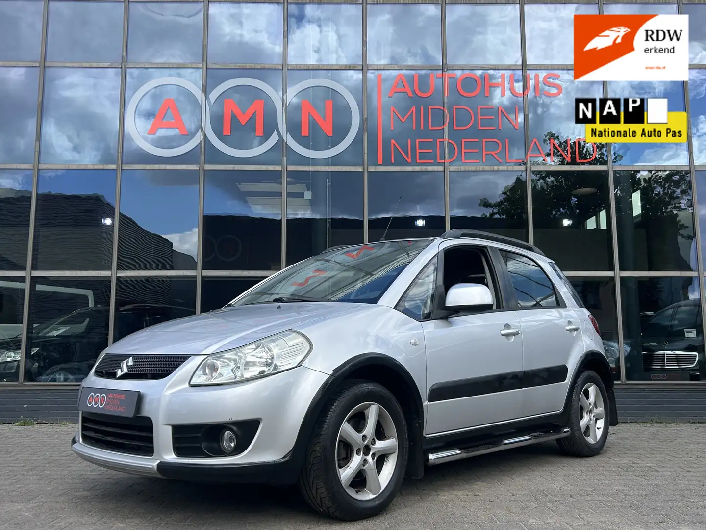Suzuki SX4 1.6 Comfort Elekpakket,Navigatie,Airco,LMV16” Grigio - 1