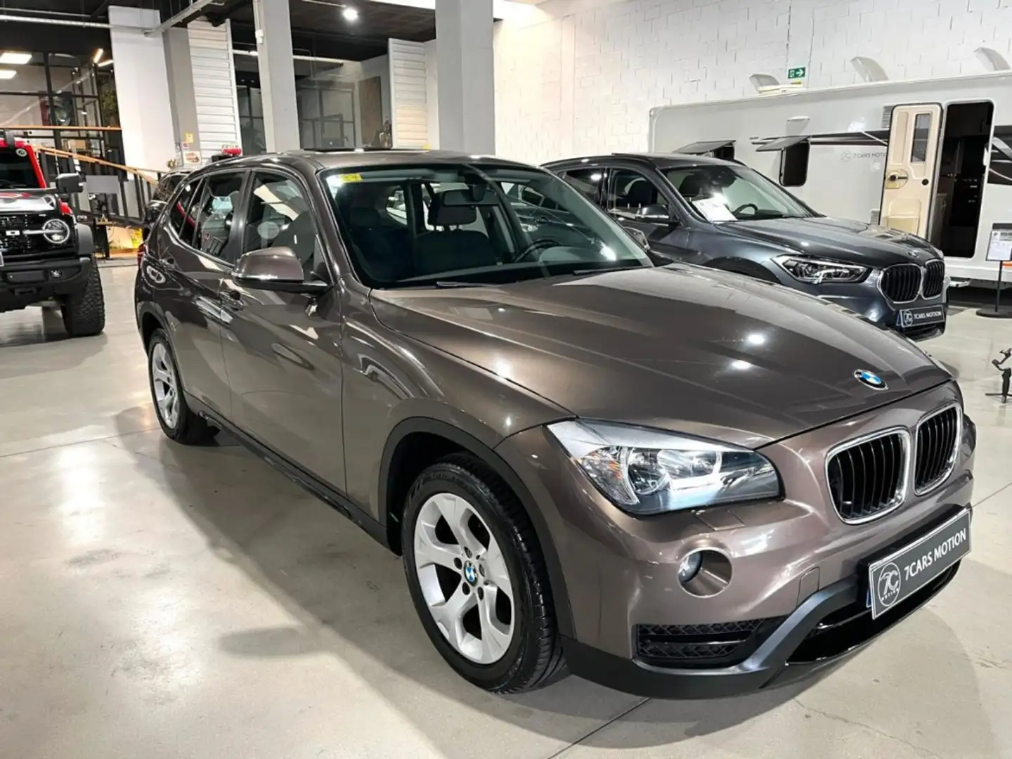 BMW X1 sDrive 18d Bruin - 1