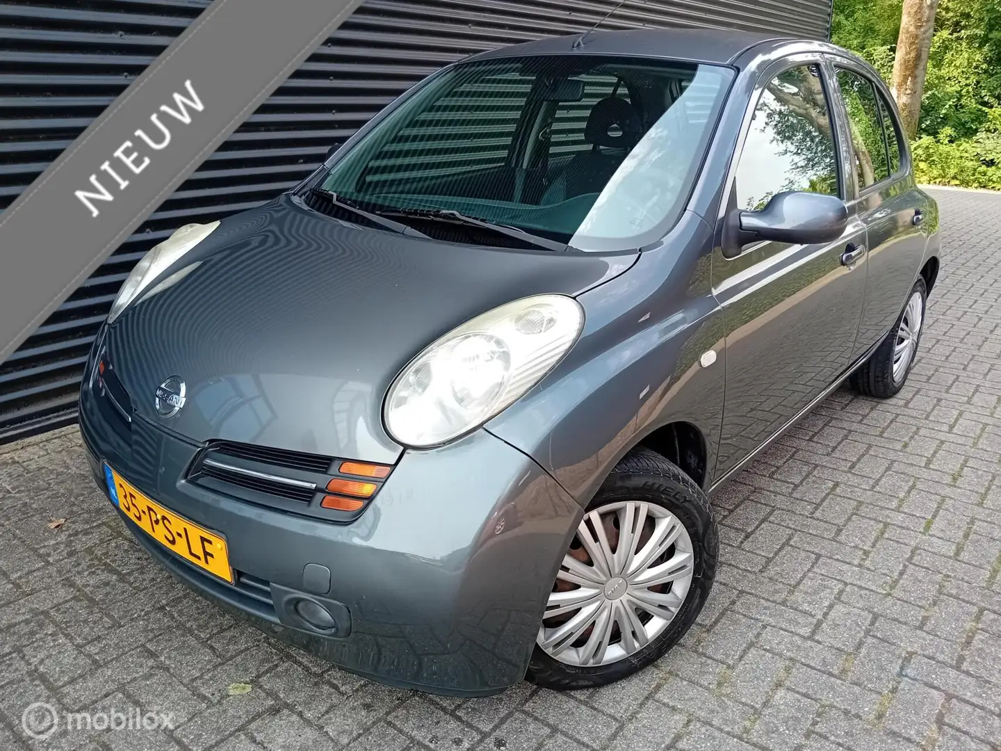 Nissan Micra 1.2 Acenta 5 drs. Airco, Centrale vergr. Grijs - 2