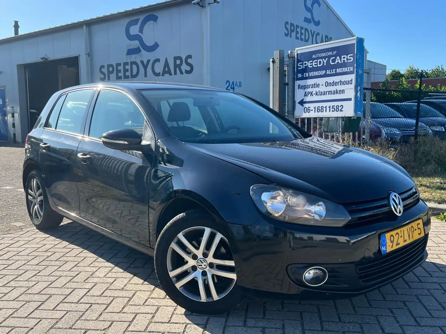 Volkswagen Golf 1.2 TSI Tour 2010 Airco Cruise Clima Trekhaak 5DRS Zwart - 1