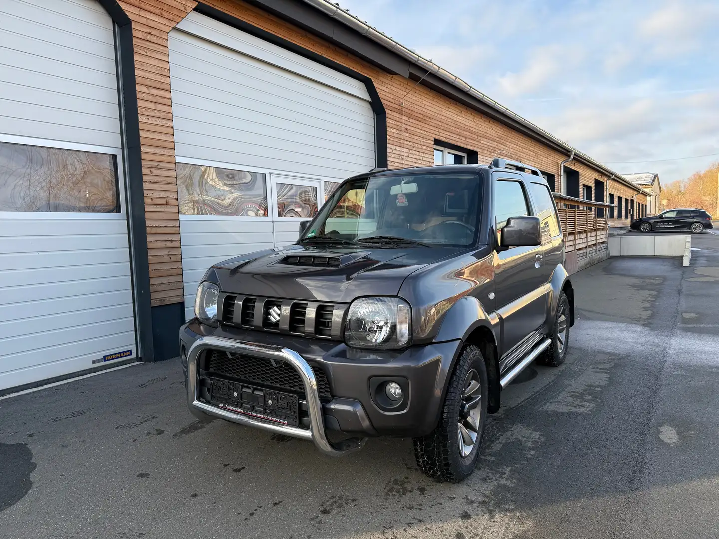 Suzuki Jimny Jimny Style 1.3 Allgrip 4x4 AHK Allrad Grau - 1