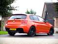 BMW 135 1-serie M135i xDrive High Executive ZEER UNIEKE AU Oranje - thumbnail 15