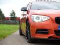BMW 135 1-serie M135i xDrive High Executive ZEER UNIEKE AU Oranje - thumbnail 16