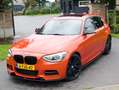 BMW 135 1-serie M135i xDrive High Executive ZEER UNIEKE AU Oranje - thumbnail 12