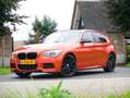 BMW 135 1-serie M135i xDrive High Executive ZEER UNIEKE AU Oranje - thumbnail 14