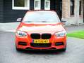 BMW 135 1-serie M135i xDrive High Executive ZEER UNIEKE AU Oranje - thumbnail 4