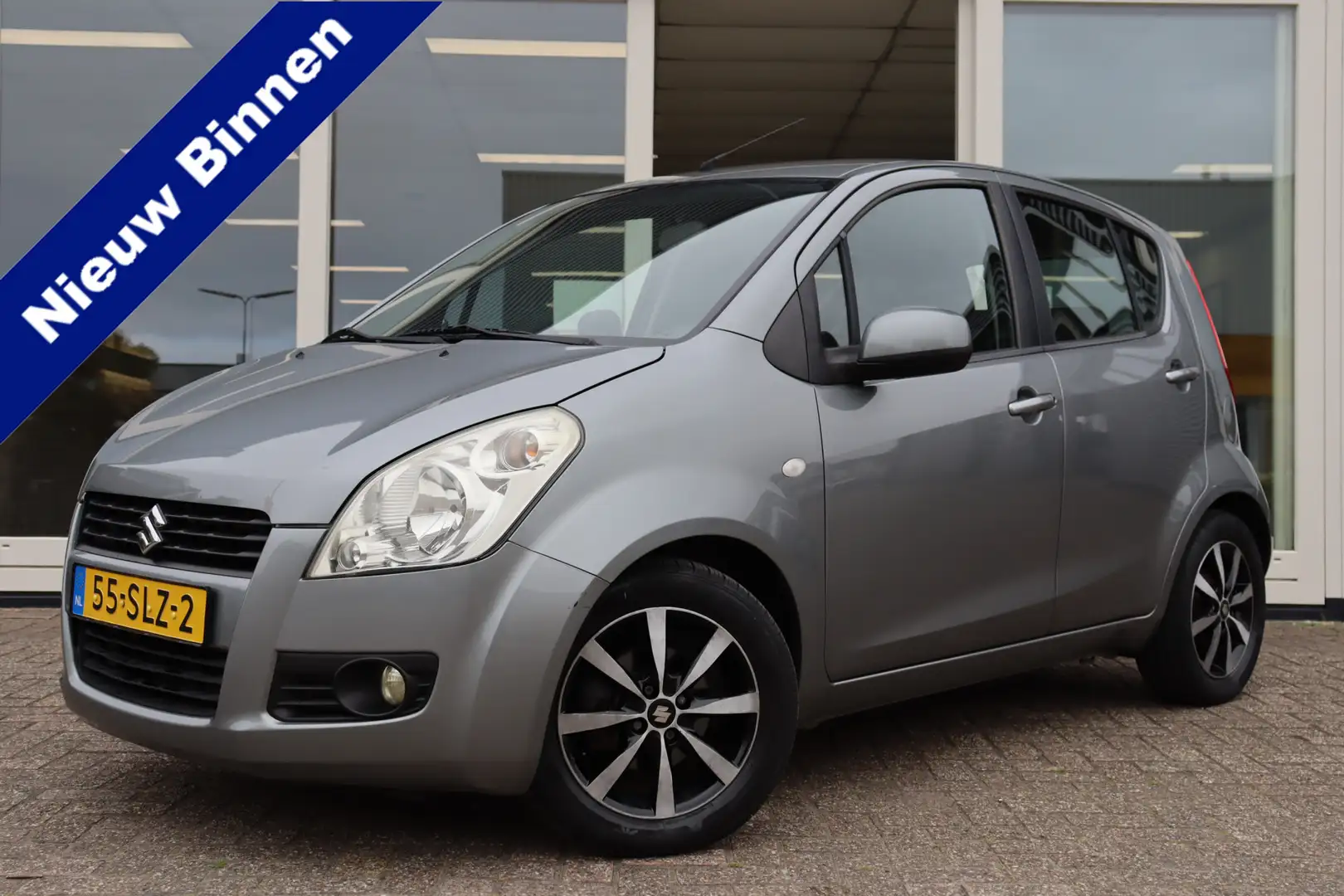 Suzuki Splash 1.0 VVT Comfort, Airco, NAP, LMV, Prijs is rijklaa Gris - 1