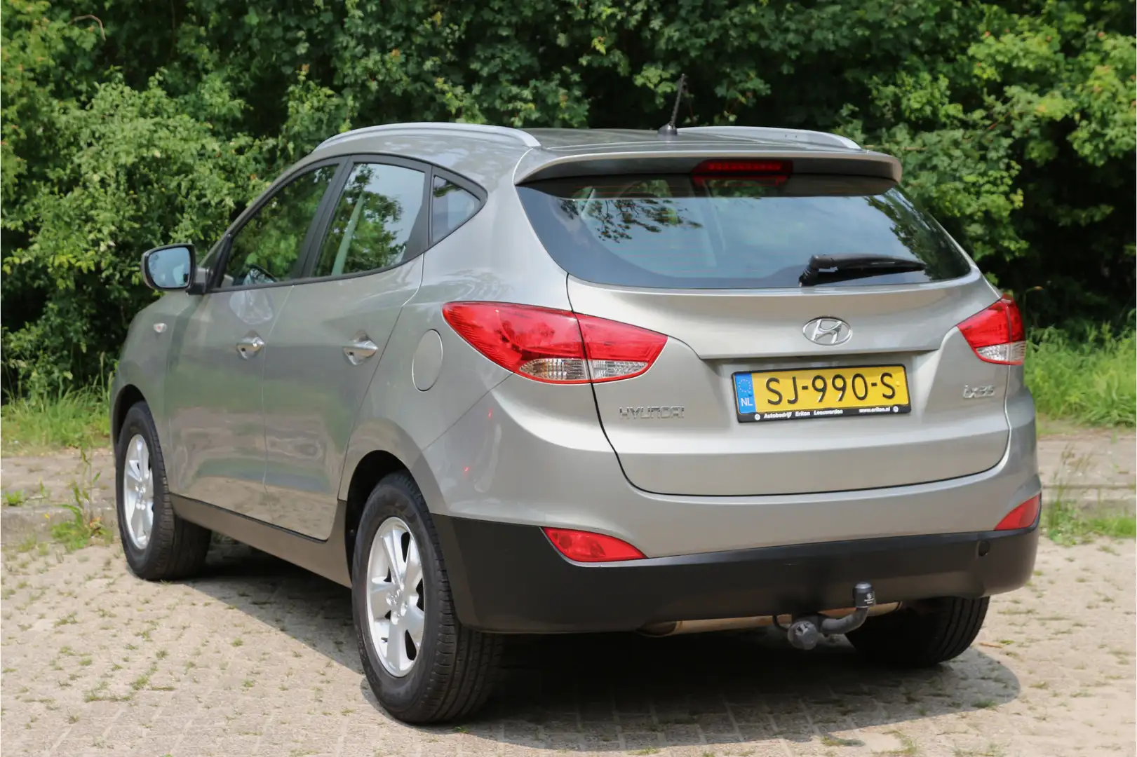 Hyundai iX35 2.0i 165pk Active UNIEK! | Lage KM. stand! | 1.900 Gris - 2