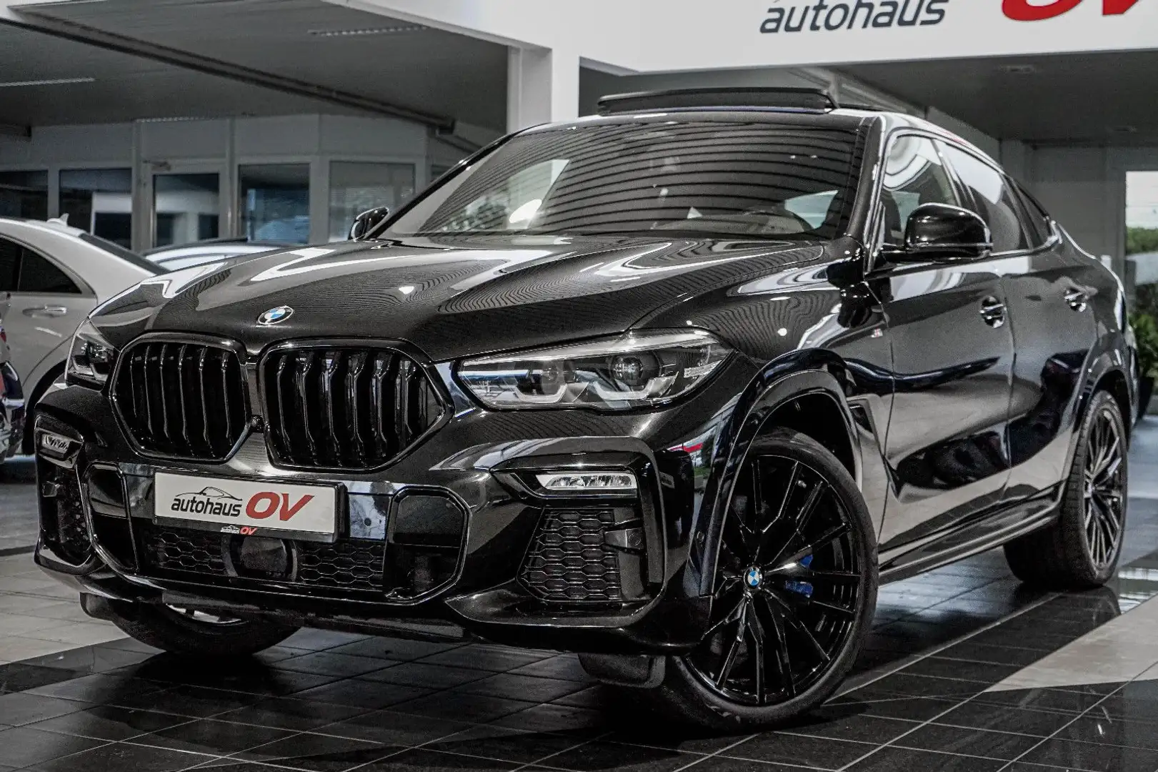 BMW X6 40xd M Sport*3xTV*Carbon*Massage*ACC*PanoSKY* Zwart - 1