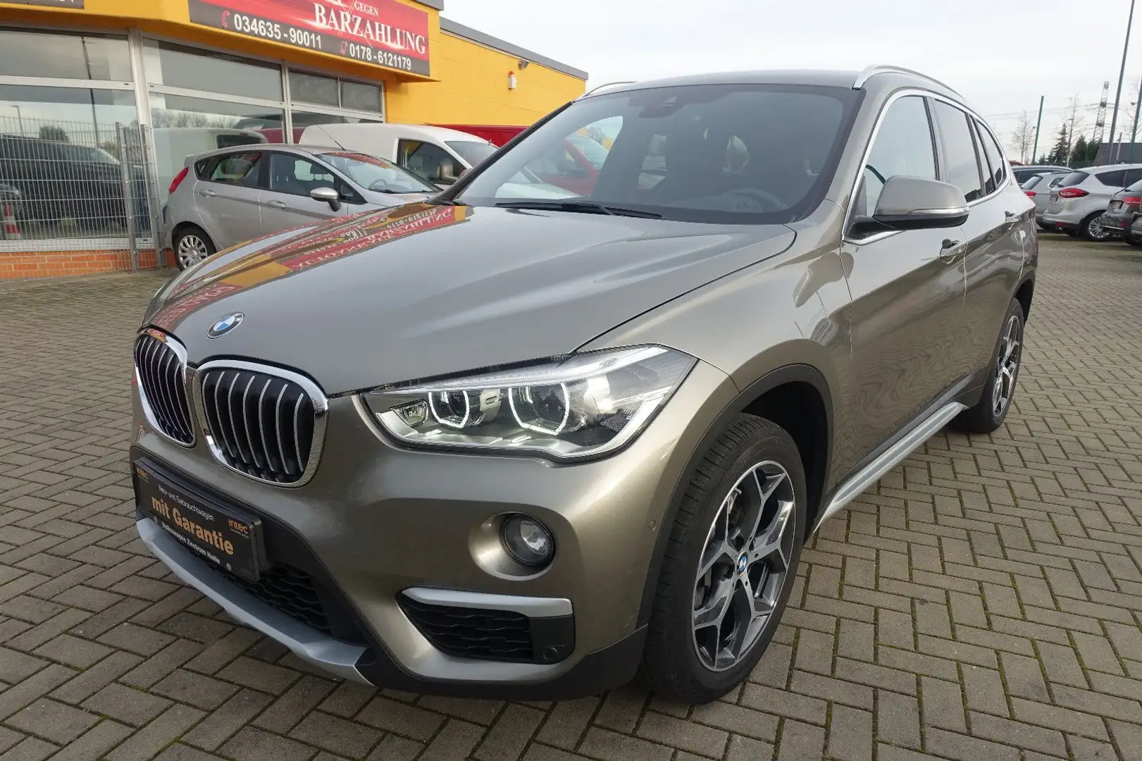 BMW X1 xDrive 20i xLine*LED*ACC*Headup*Leder*Navi* Grijs - 1