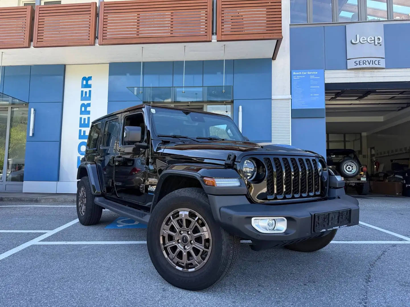Jeep Wrangler Wrangler Sahara 2.0 PHEV 380PS AT 4XE Schwarz - 1