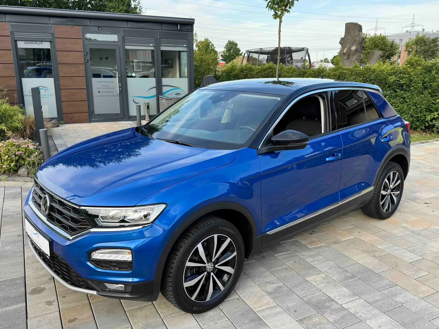 Volkswagen T-Roc Style TSI *Navi*AHK*PDC*App-Con*2Hand* Blauw - 1