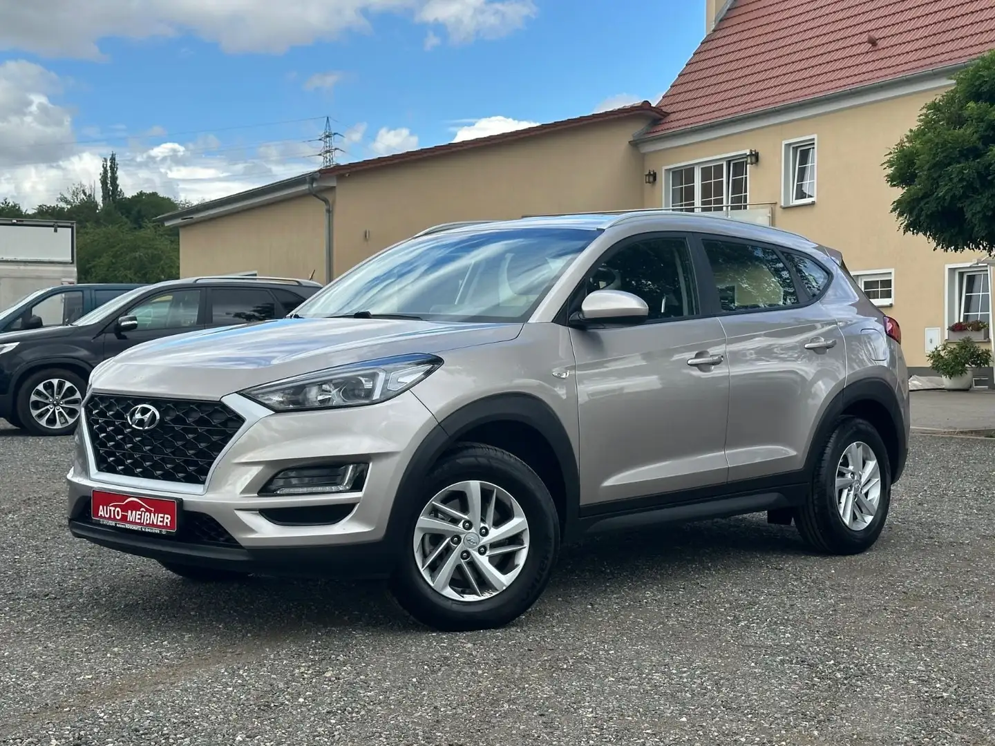 Hyundai TUCSON Select 2WD * Kamera * Navi * Sitzh.* Weiß - 1