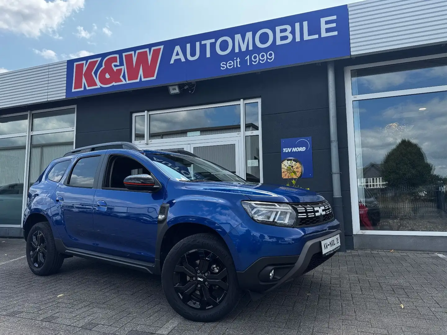 Dacia Duster II Extreme NAVI+CAM AHK SORGENFREI PAKET Blau - 1