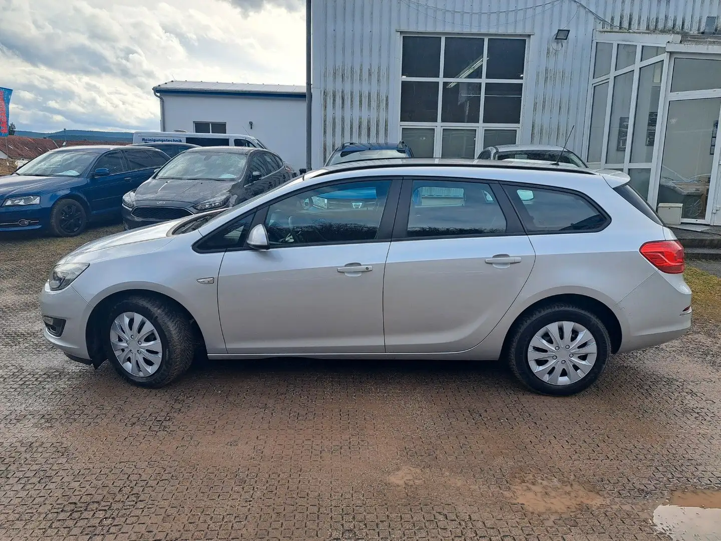 Opel Astra J 1.6 Sports Tourer Selection AHK TÜV NEU Plateado - 1