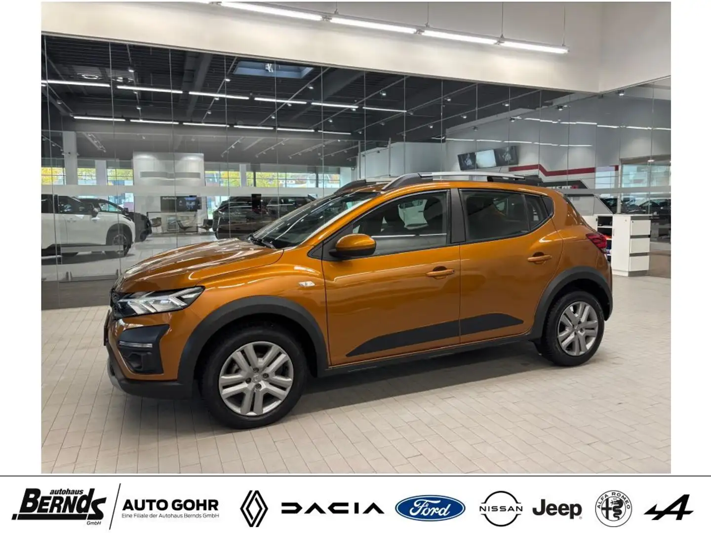 Dacia Sandero Stepway TCe 90 Comfort KLIMAAUTOMATIK DAB+Radio Arancione - 1