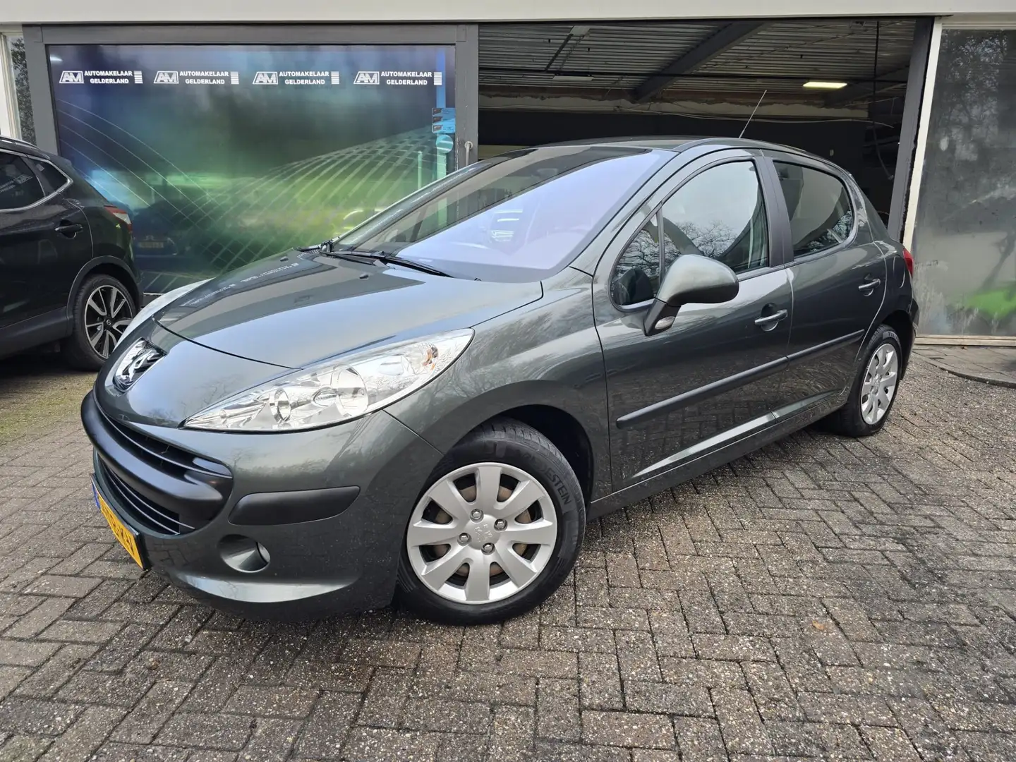 Peugeot 207 1.4-16V XT | 2E EIGENAAR | 12MND GARANTIE | AIRCO Grigio - 1