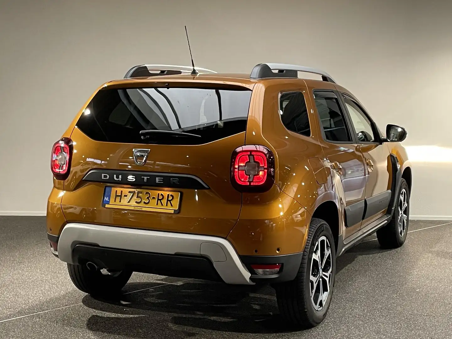 Dacia Duster 1.0 TCe Bi-Fuel Prestige LPG | Navigatie | Clima | Oranje - 2