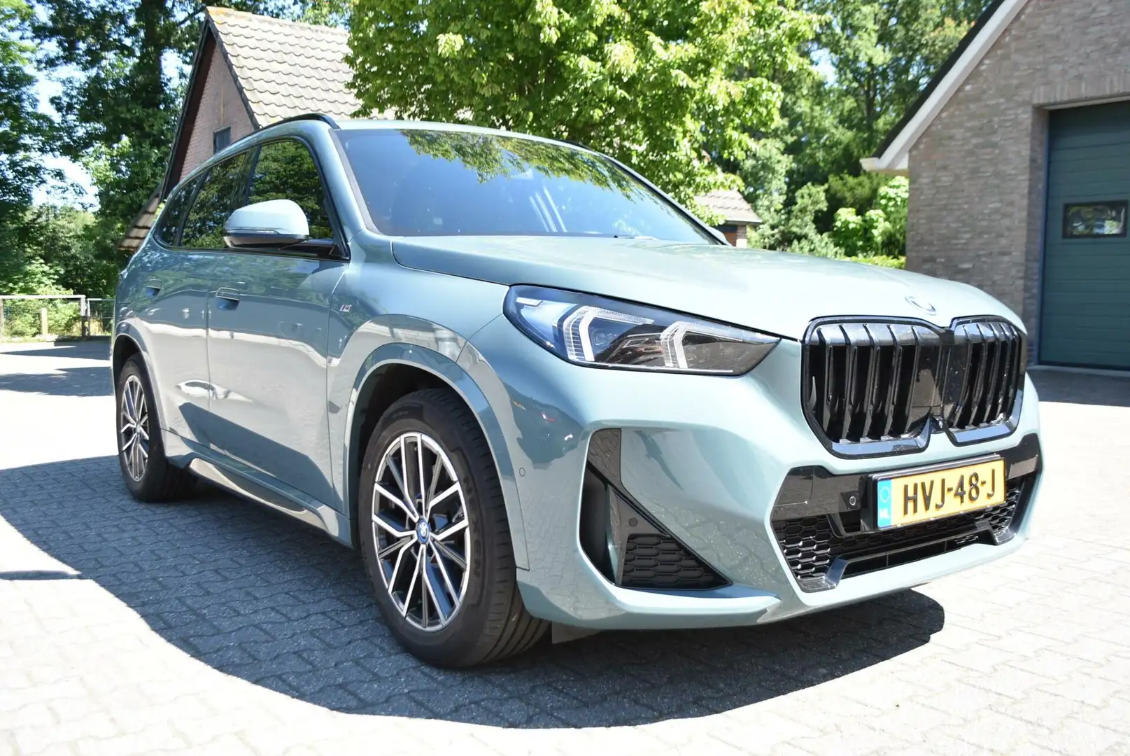 BMW X1 xDrive25e M Sportpakket Groen - 1