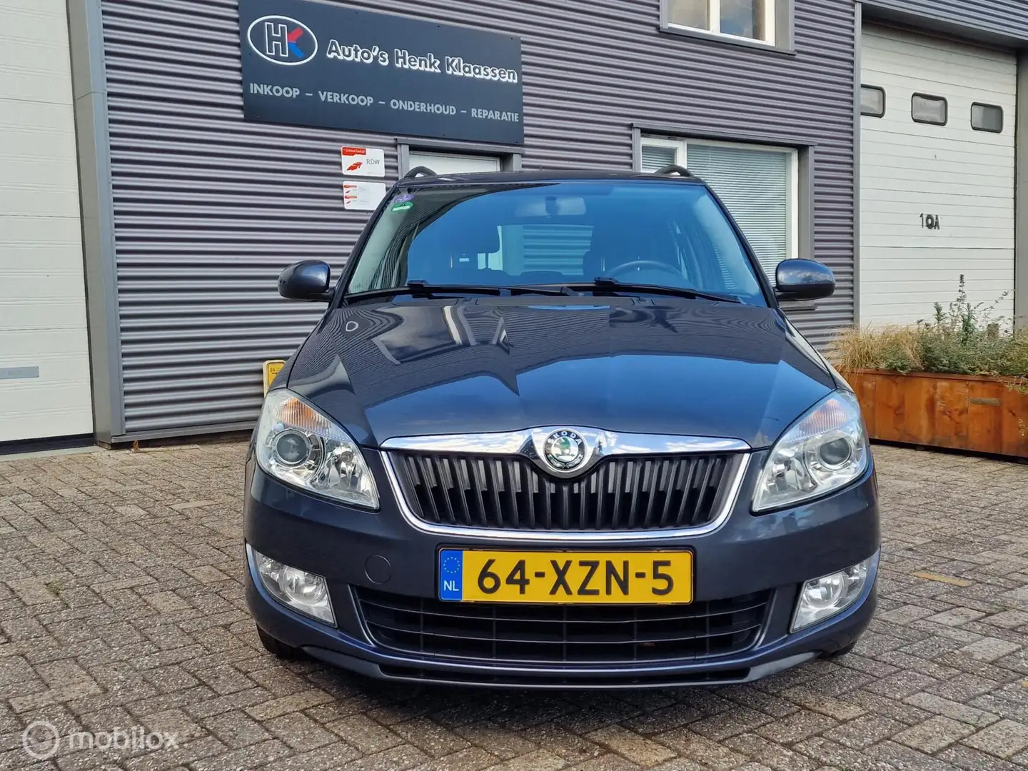 Skoda Fabia Combi 1.2TSi Airco LM elRam CDVab Navi CruiseCon Grijs - 2