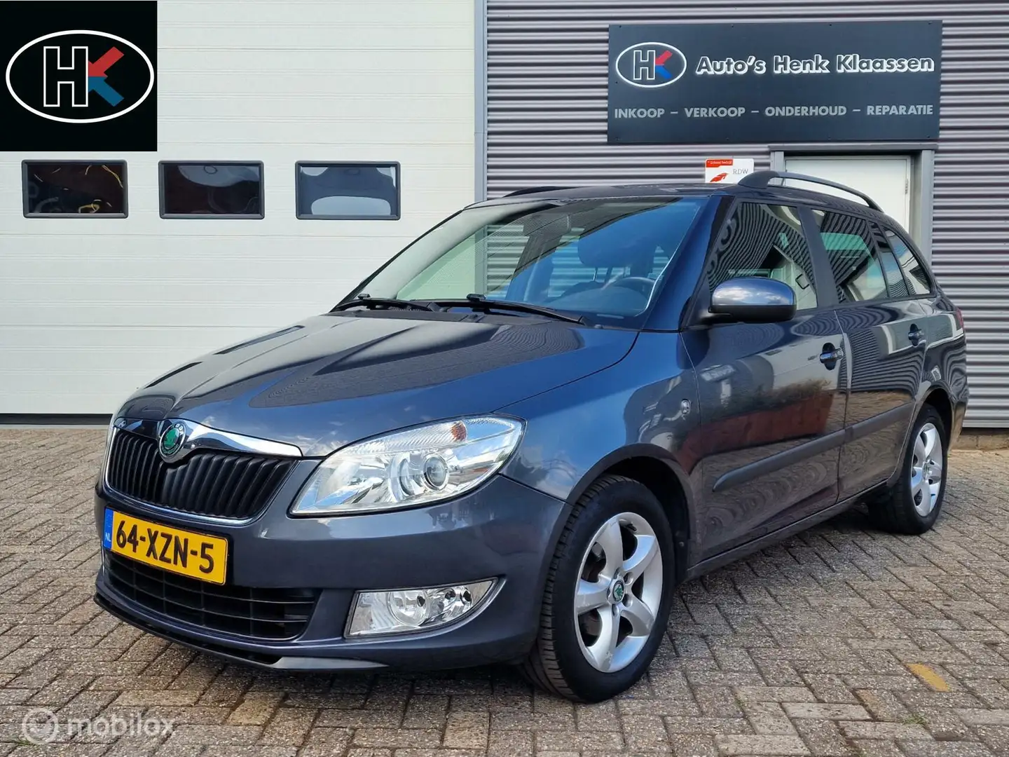 Skoda Fabia Combi 1.2TSi Airco LM elRam CDVab Navi CruiseCon Grijs - 1