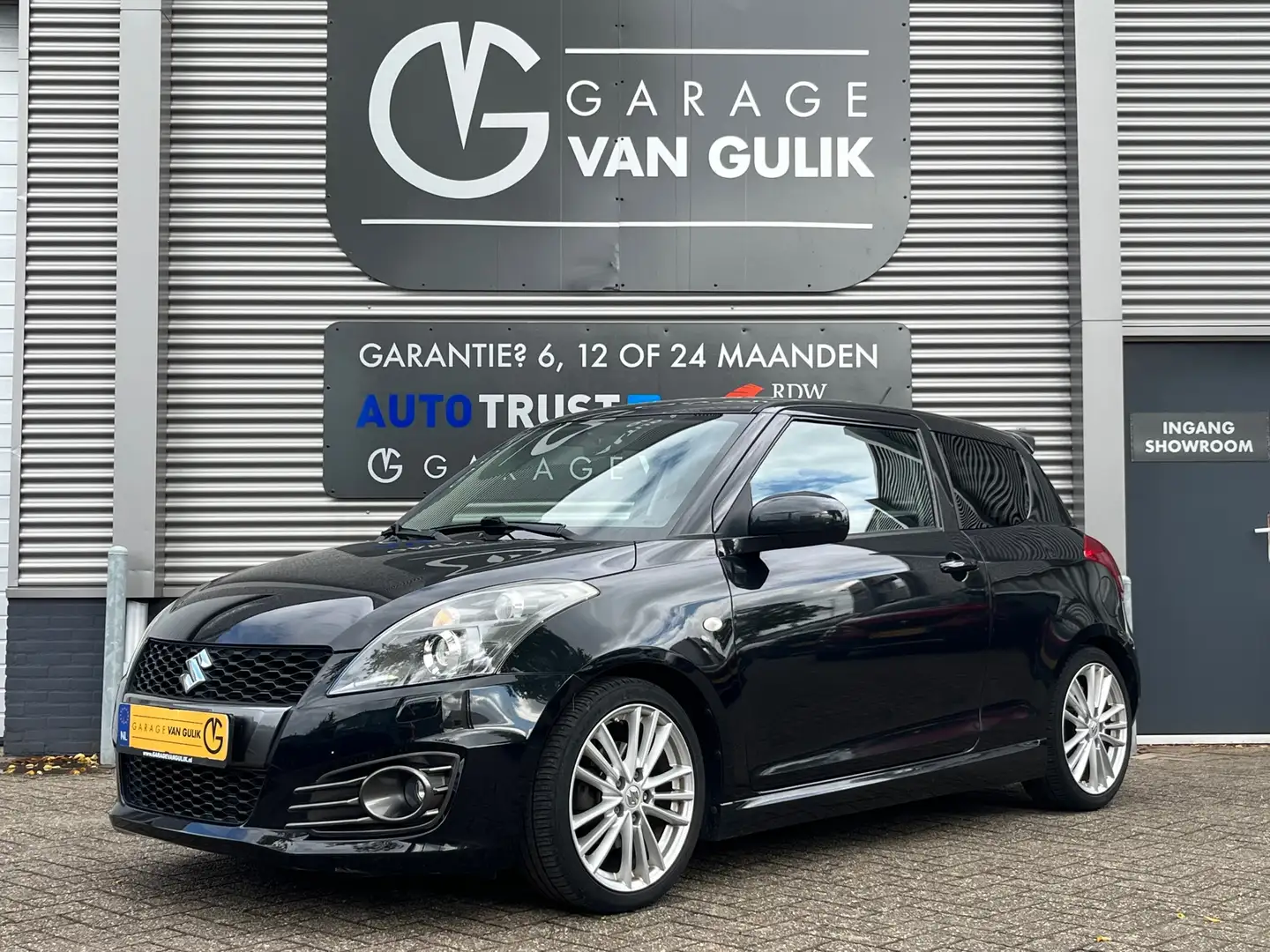 Suzuki Swift 1.6 Sport 136PK Clima,Cruise,Bluetooth,Isofix,Stoe Zwart - 1