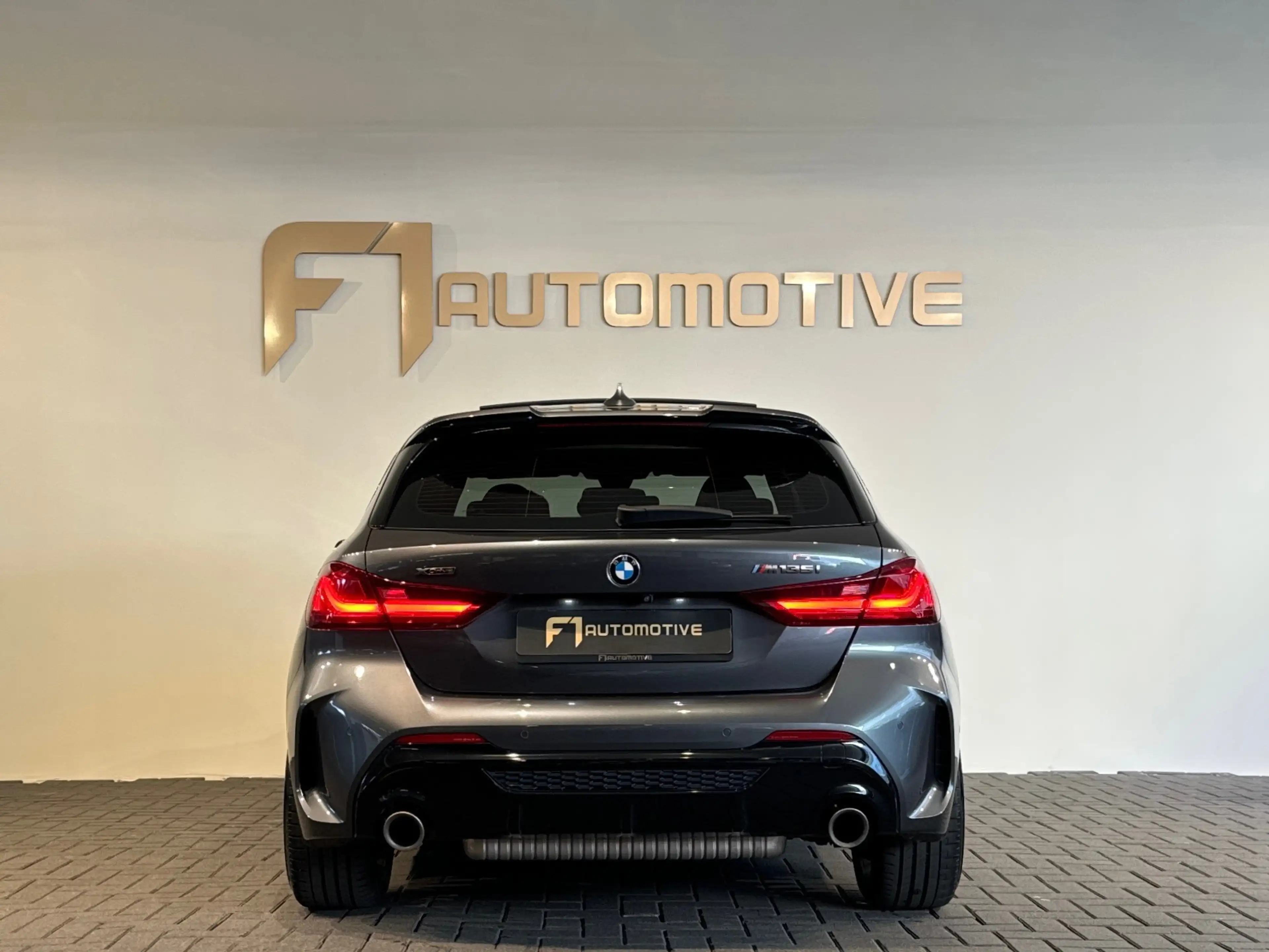 BMW 135 1-serie M135i xDrive High Executive Edition Pano|H — photo 11