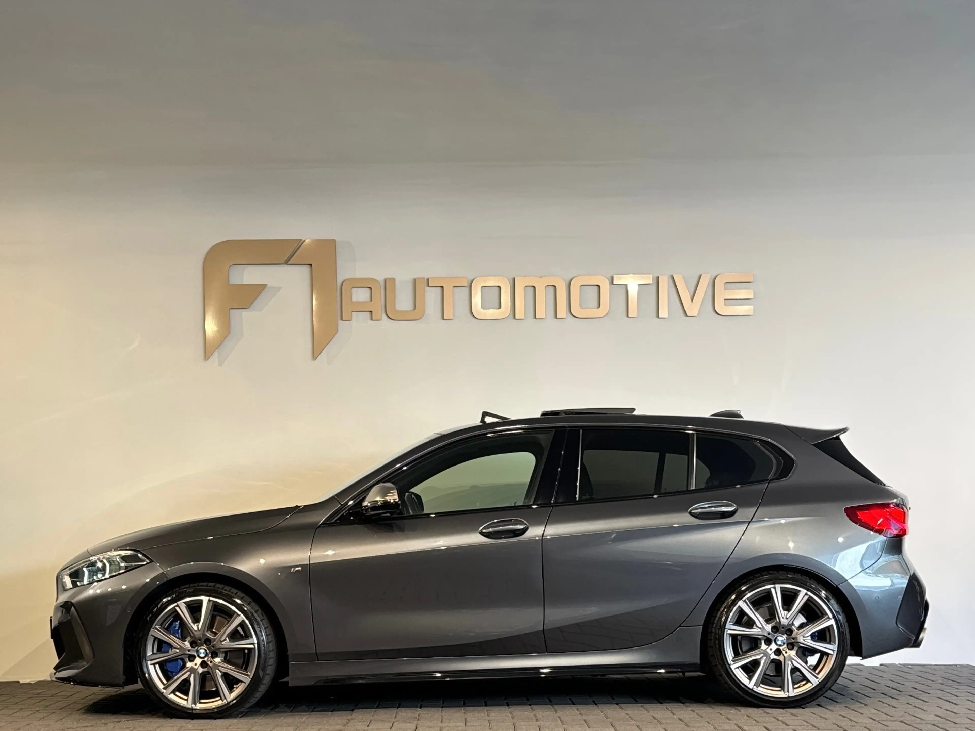 BMW 135 1-serie M135i xDrive High Executive Edition Pano|H — photo 12