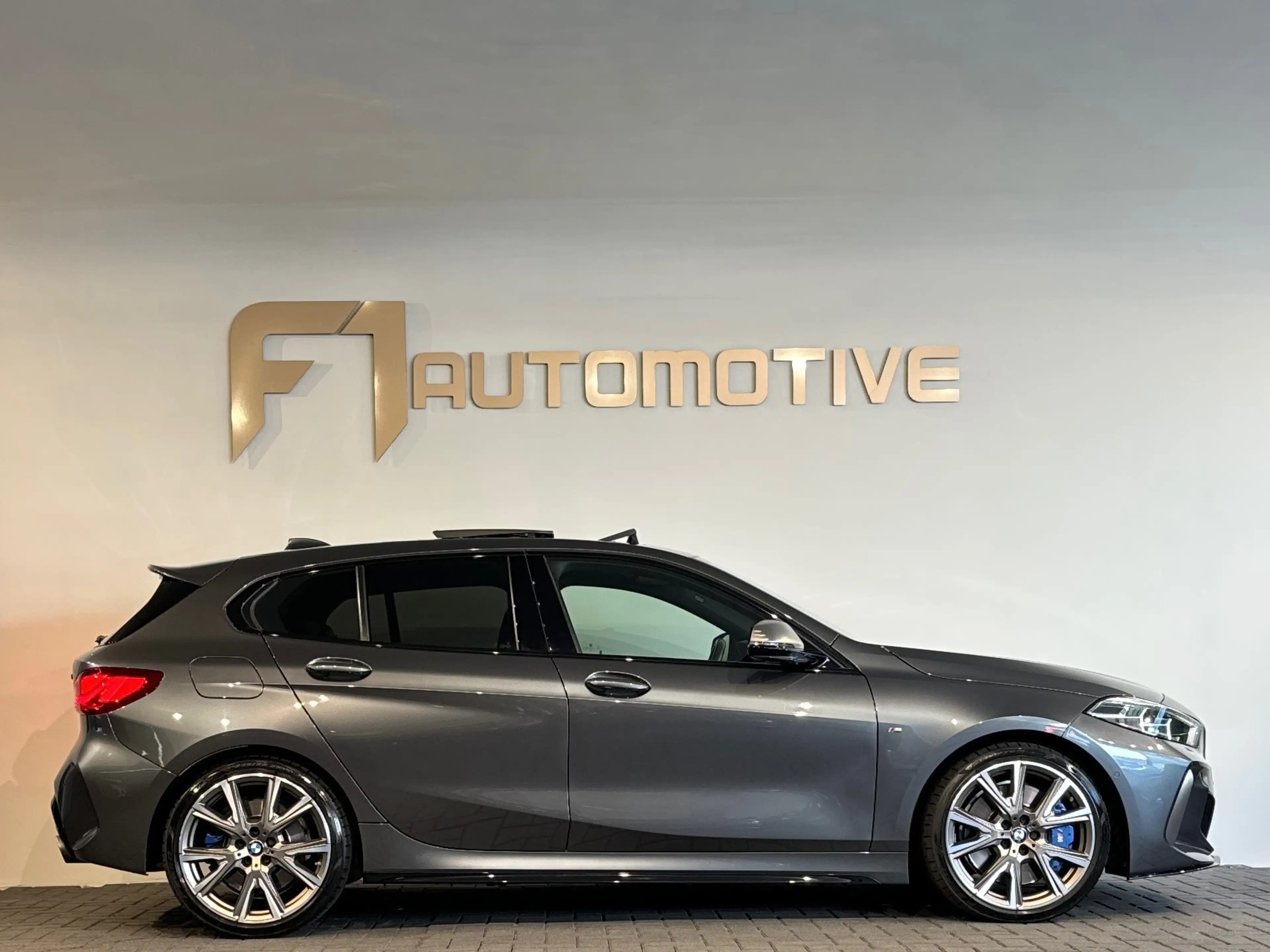 BMW 135 1-serie M135i xDrive High Executive Edition Pano|H — photo 10