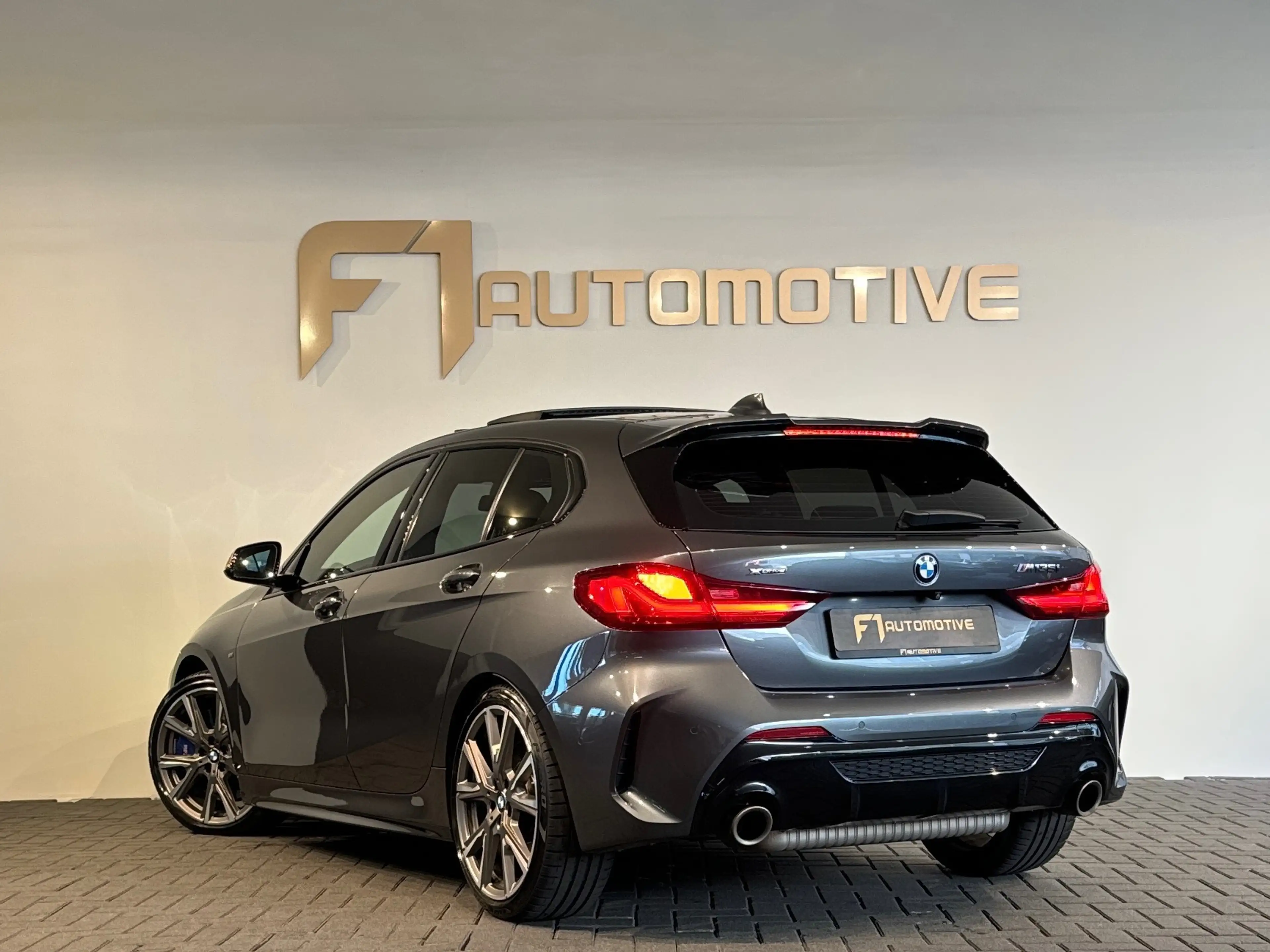 BMW 135 1-serie M135i xDrive High Executive Edition Pano|H — photo 8
