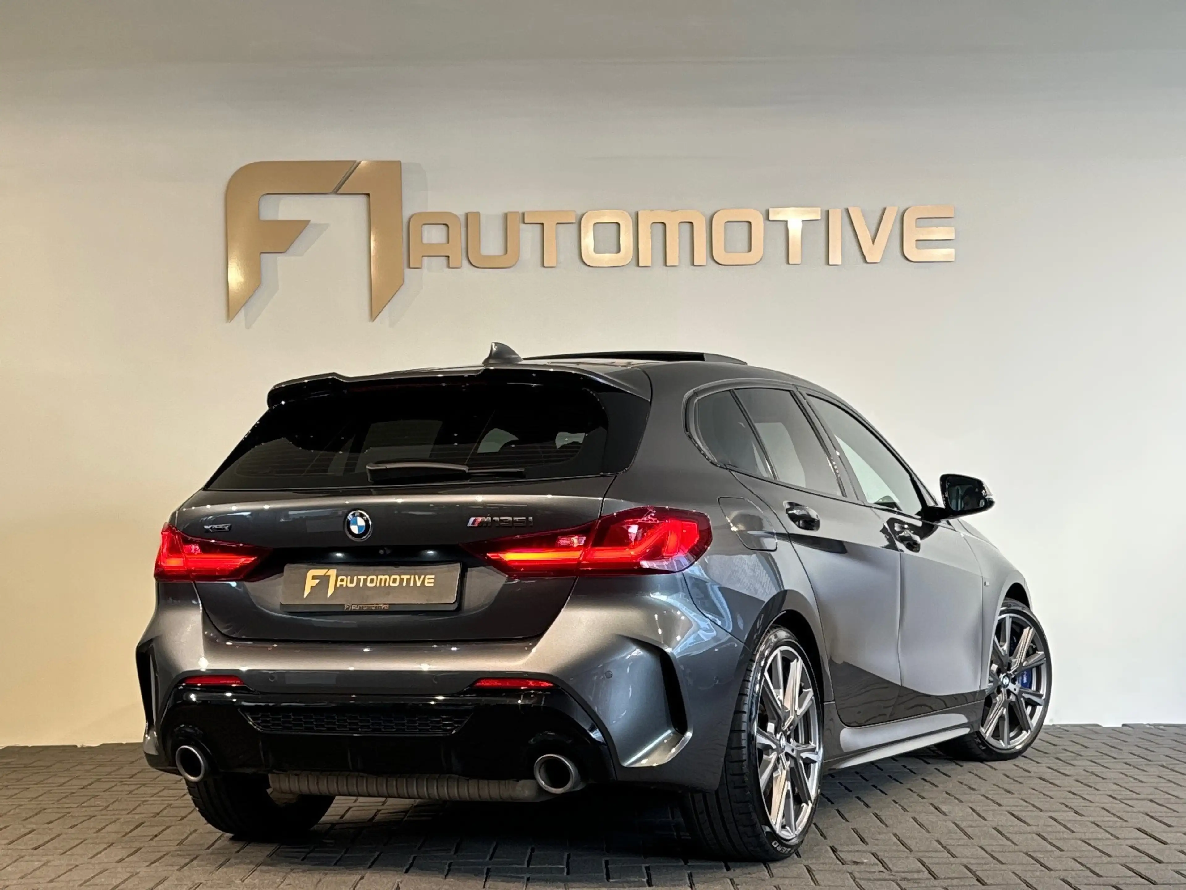 BMW 135 1-serie M135i xDrive High Executive Edition Pano|H — photo 3
