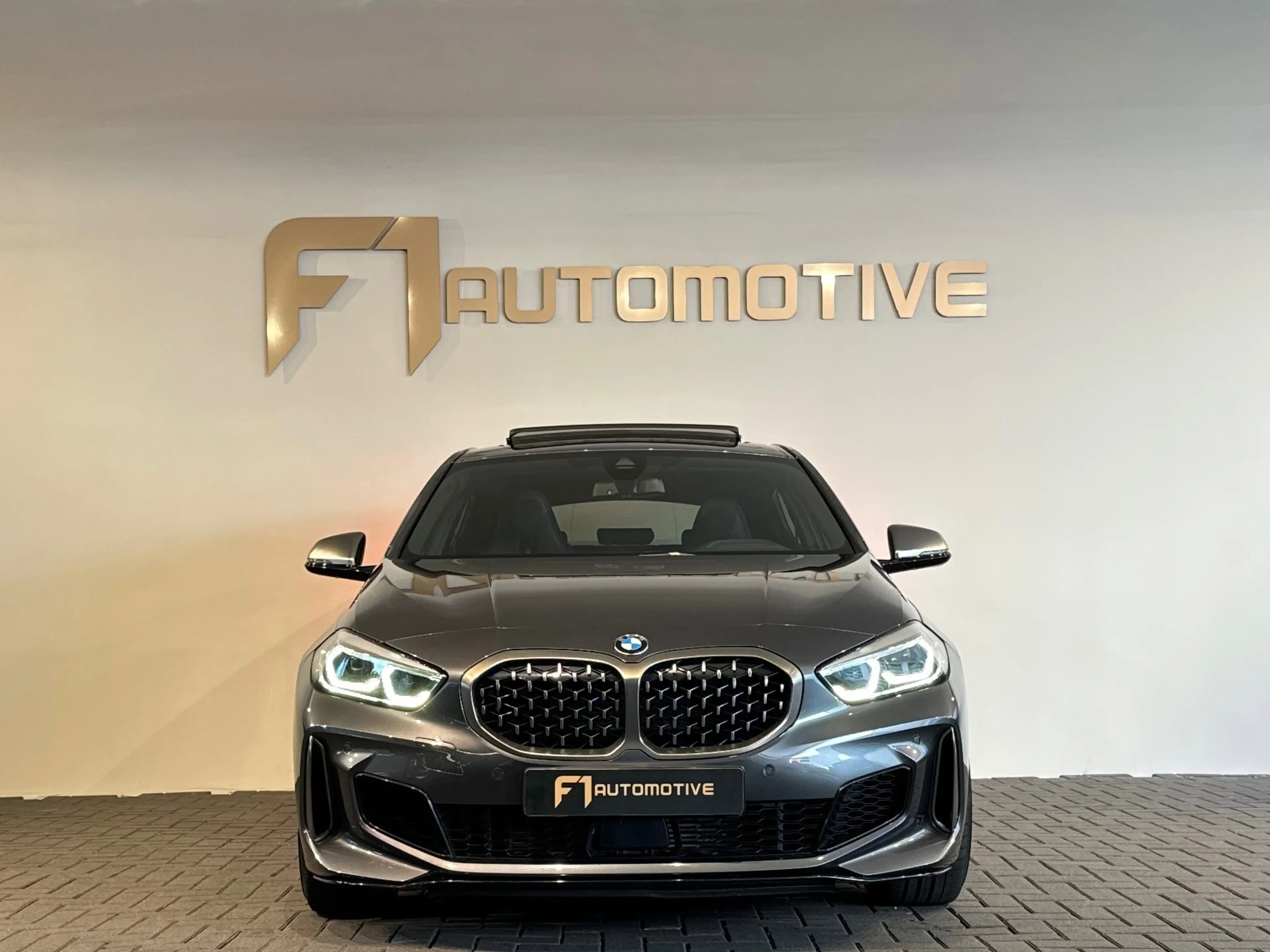 BMW 135 1-serie M135i xDrive High Executive Edition Pano|H — photo 9