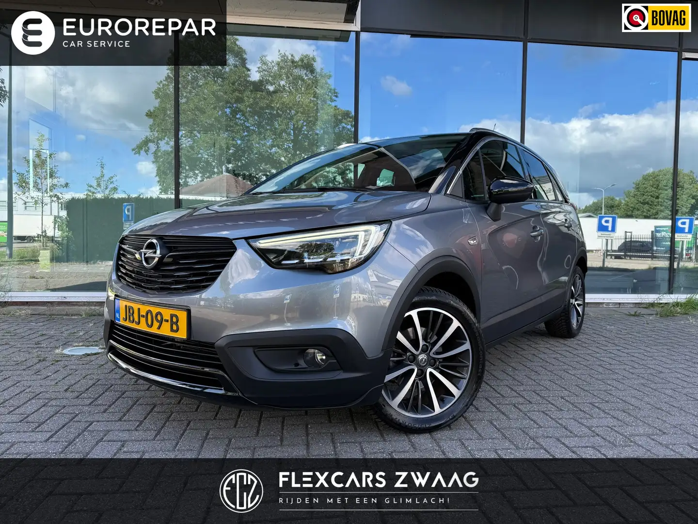 Opel Crossland X 1.2 Turbo 130pk Ultimate - Camera - Navi - Panoram Grau - 1