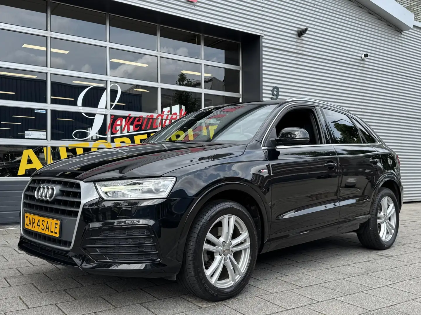 Audi Q3 1.4 TFSI CoD Sport Pro Line - Navigatie I Sport pa Zwart - 1