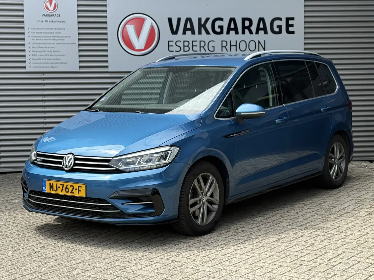 Volkswagen Touran 1.4 TSI Highline Edition R 7p 7P,R-LINE,NAV/CAM,MA Blauw - 1
