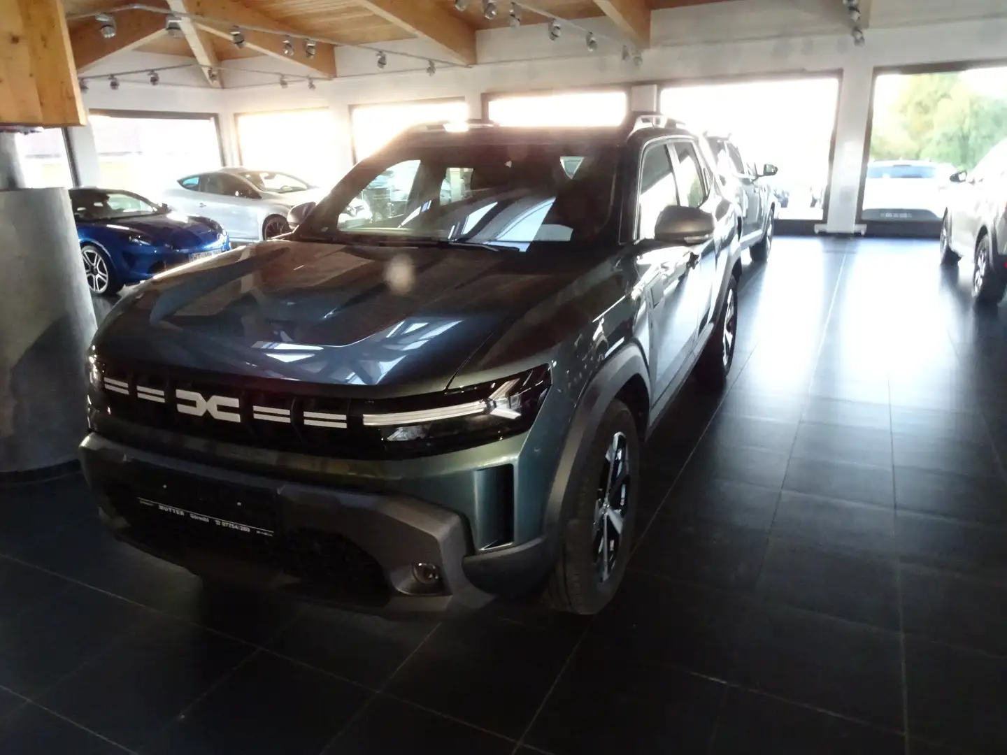 Dacia Duster Hybrid 140 Journey Grün - 1